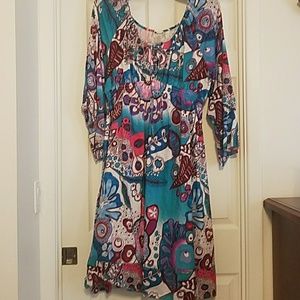 Never worn, bright colored,  bell sleeve